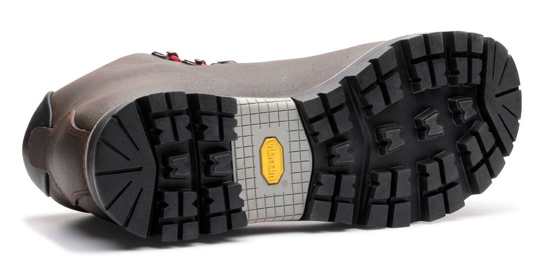 Super Rando Mid - Coupe technique d'une semelle Vibram Galibier montrant la coque Durastep et l'amorti SpringLug intégré.