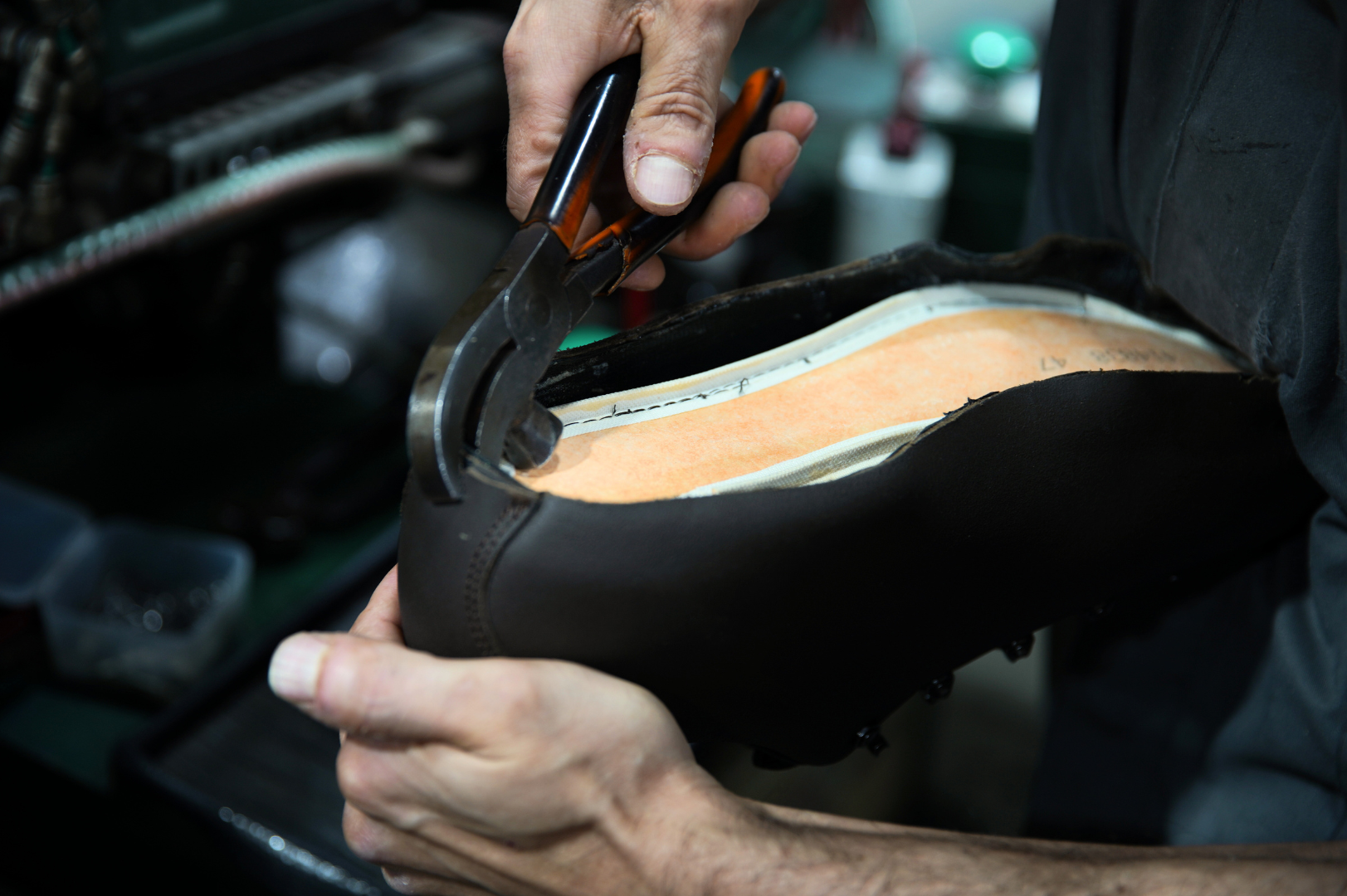 Handcrafted manufacture of a Galibier waterproof hiking shoe in the workshop.